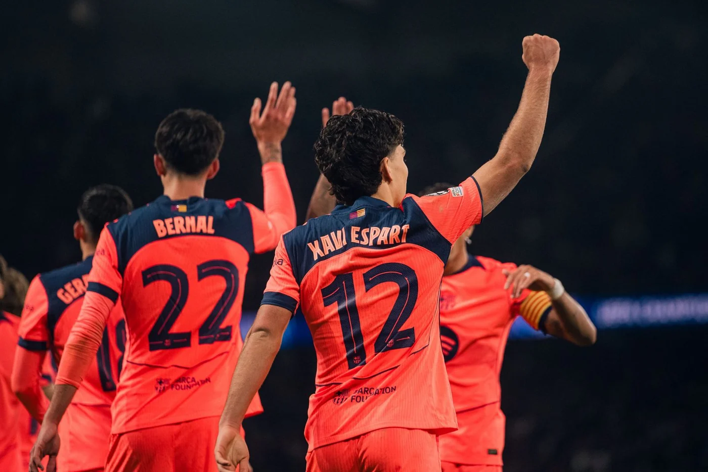Xavi Espart celebrates with Barcelona teammates against PSG