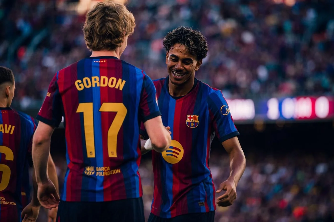 Lamine Yamal and Anthony Gordon celebrate during Barcelona’s victory over Getafe