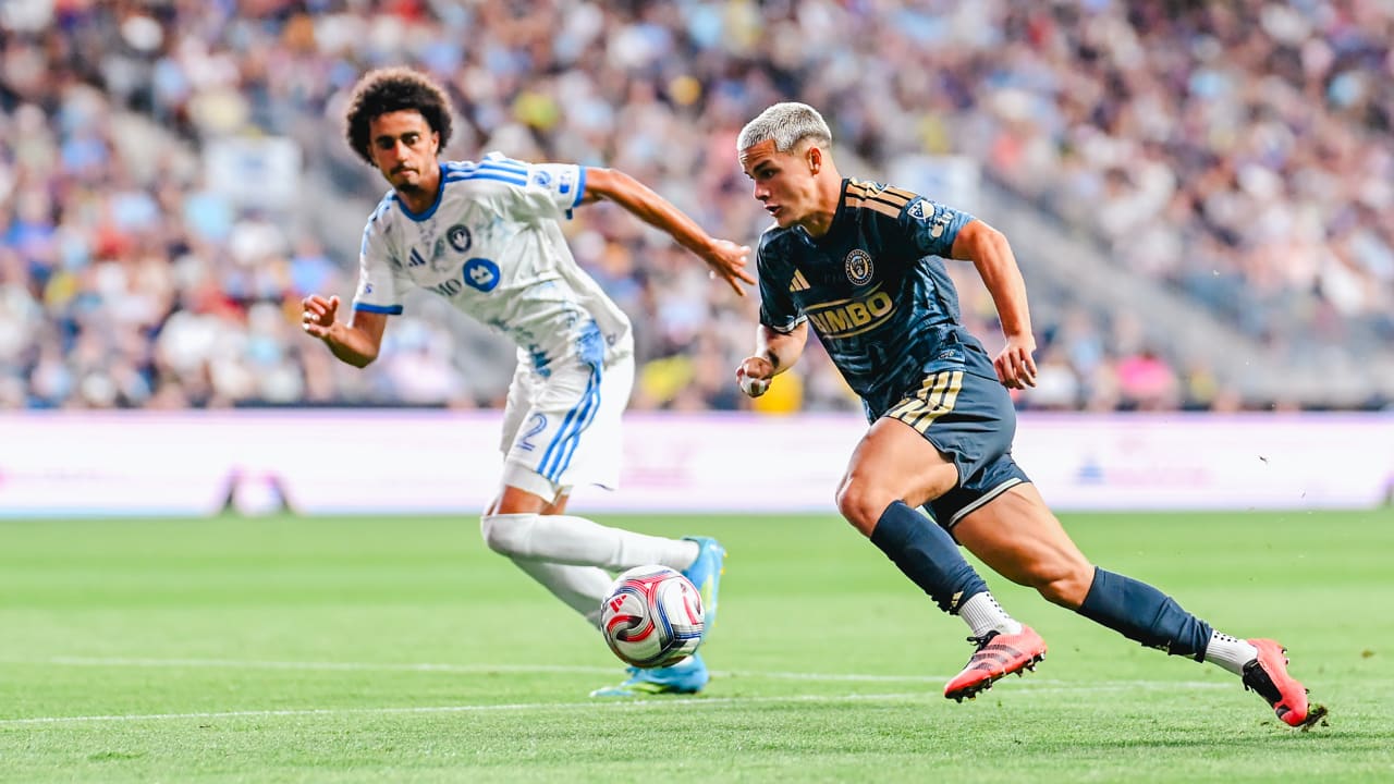 Cavan Sullivan carries the ball for the Philadelphia Union against CF Montreal
