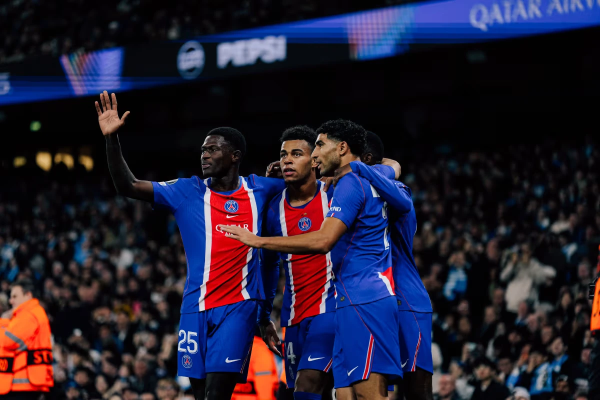 Paris Saint-Germain celebrate during their Champions League victory at Manchester City