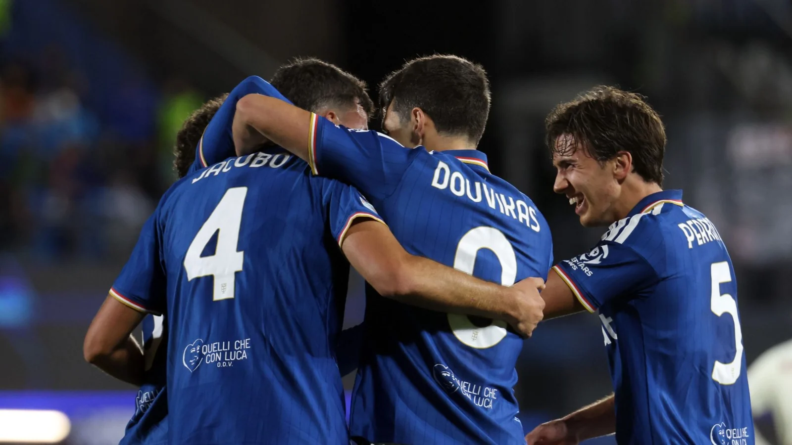 Como players celebrate during their Champions League victory over Manchester United