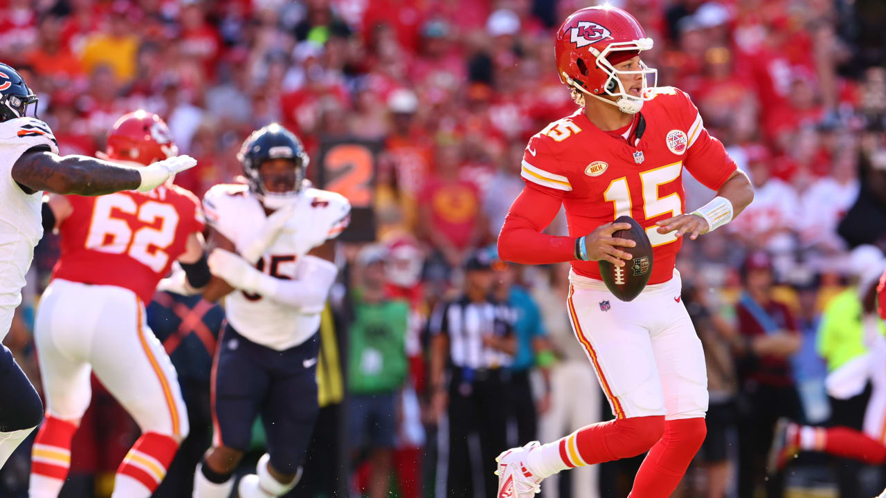 Patrick Mahomes carries the football during a Kansas City Chiefs game
