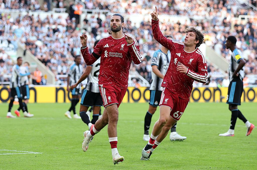 Liverpool players celebrate during their match at Newcastle United
