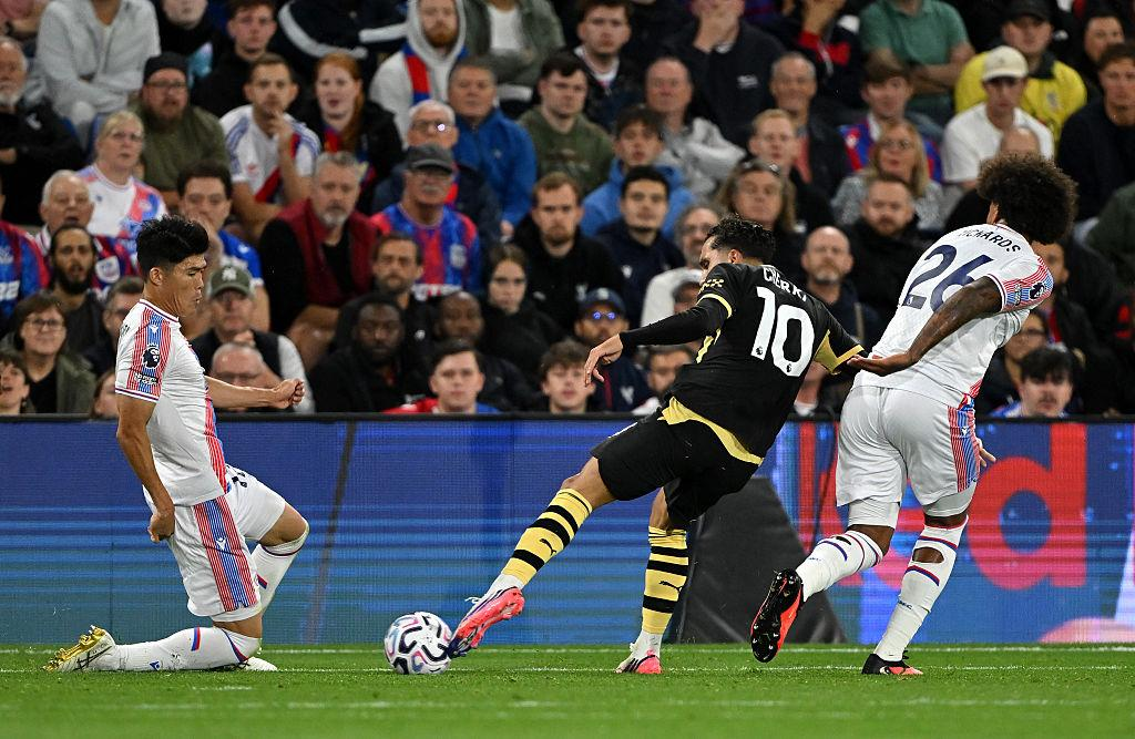 Rayan Cherki shoots for Manchester City