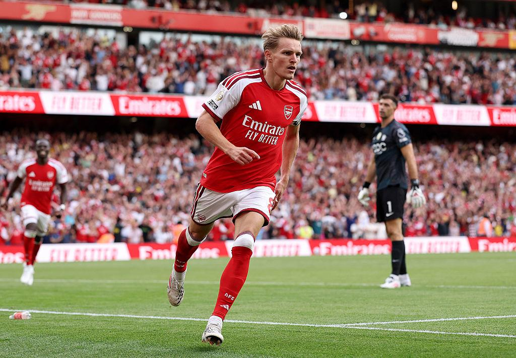 Martin Ødegaard runs for Arsenal during the win over Chelsea