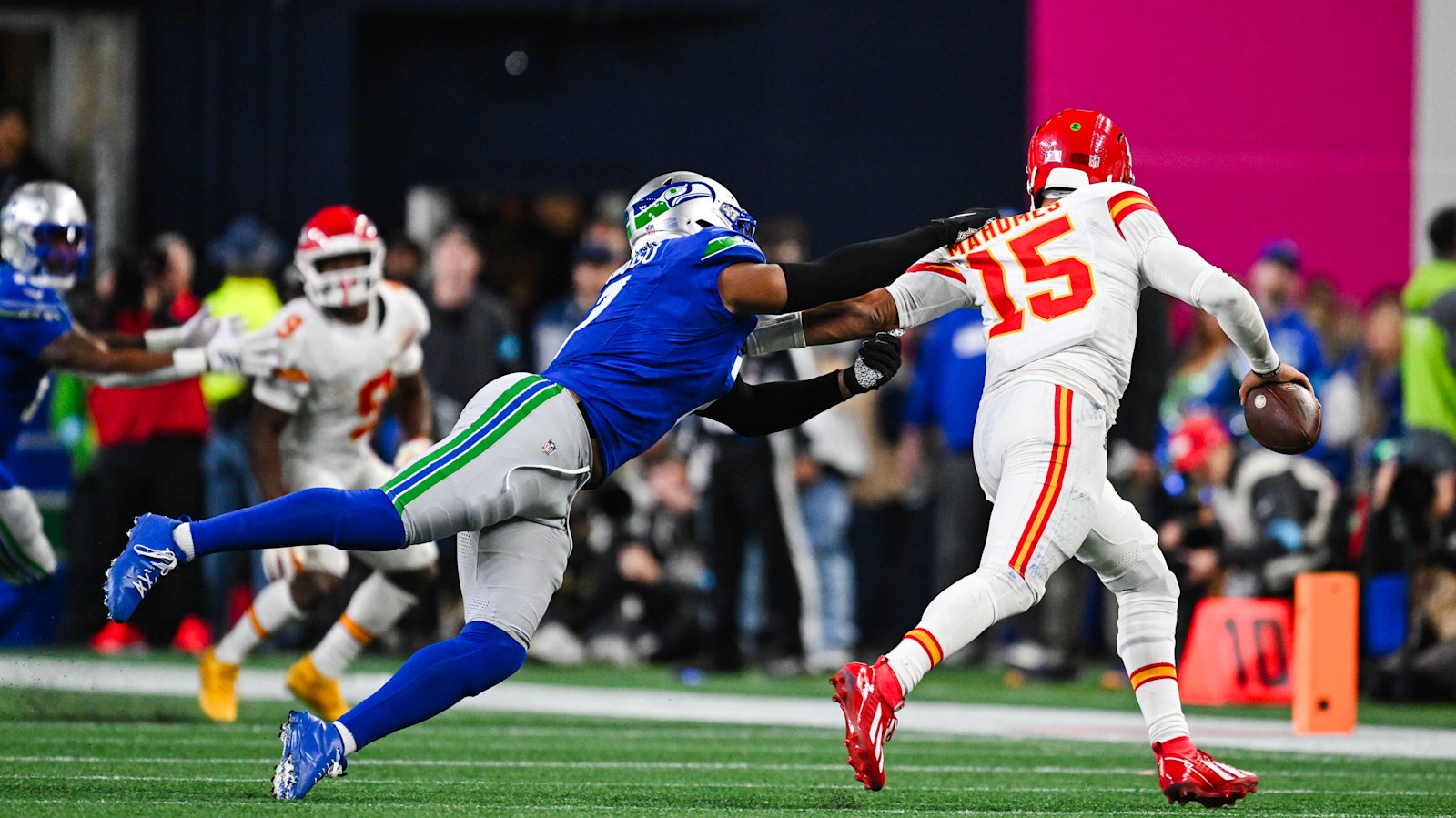 A Seahawks pass rusher closes on Patrick Mahomes during the Week 7 game at Lumen Field