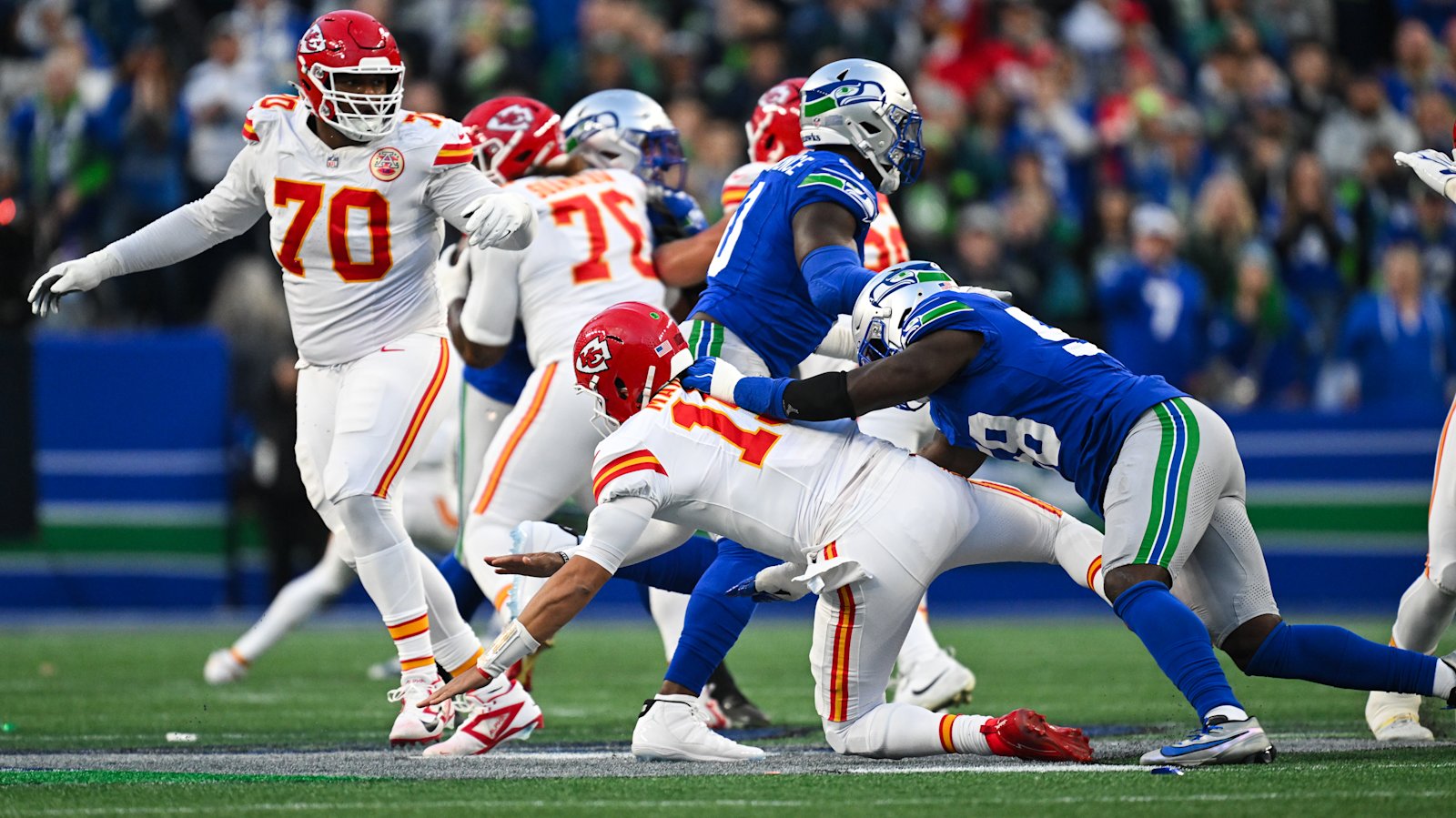 Seahawks defenders bring down Patrick Mahomes during their Week 7 win over Kansas City