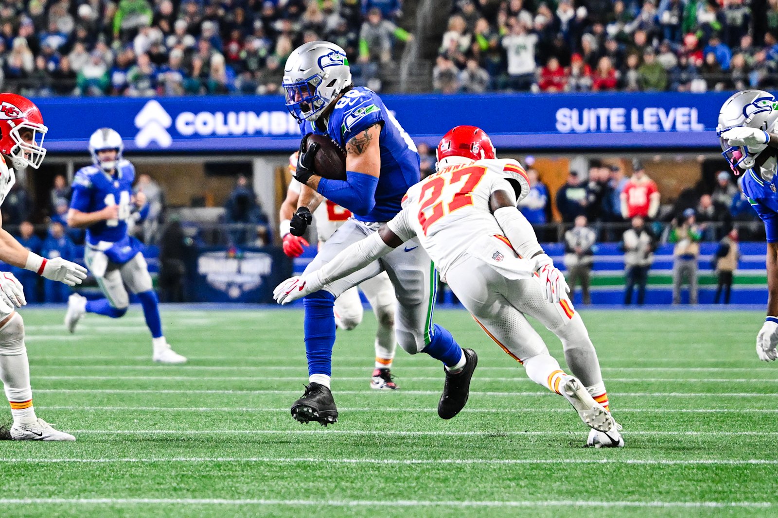 Seattle receiver Jaxon Smith-Njigba carries the ball against Kansas City in Week 7