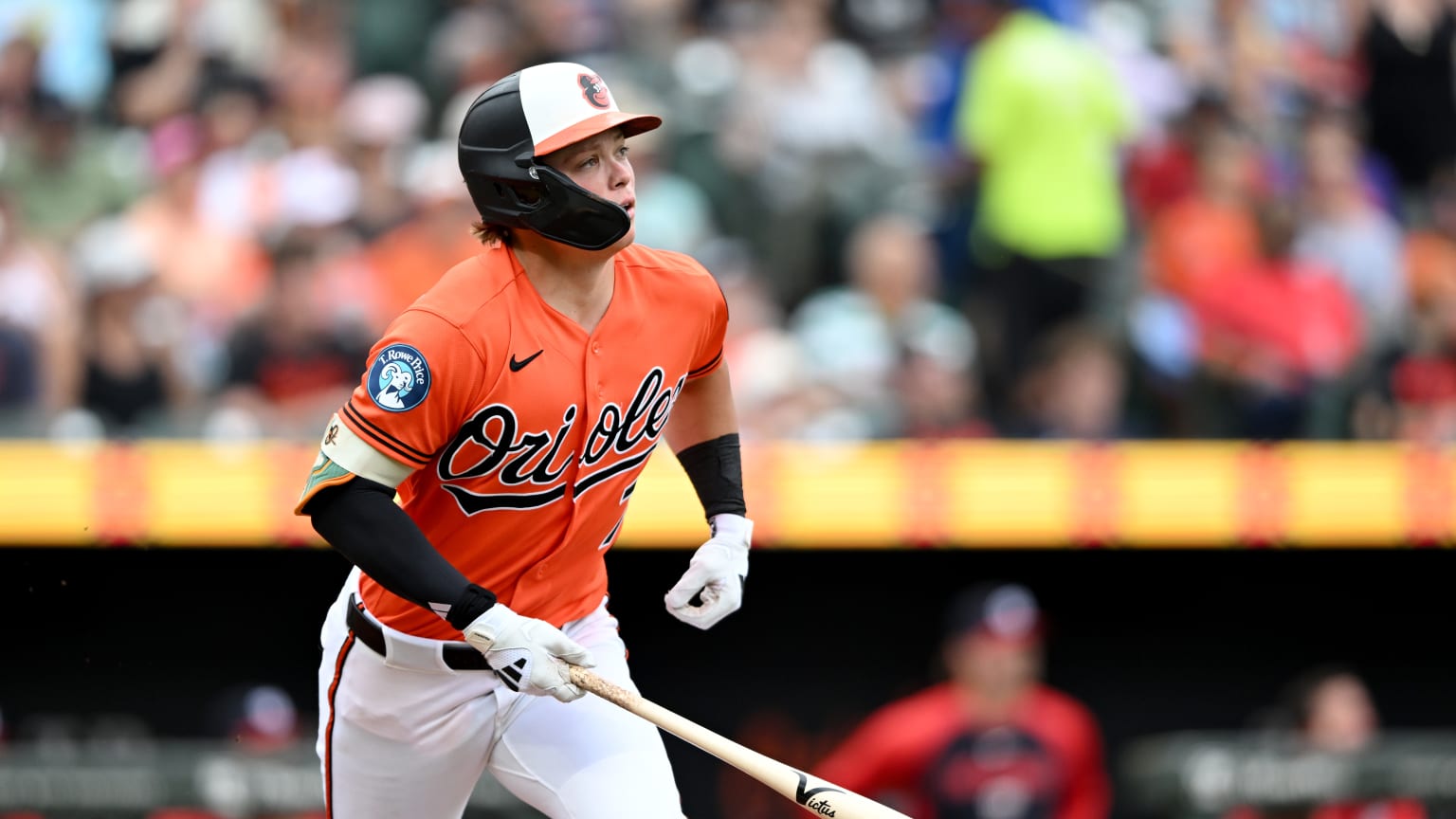 Jackson Holliday watches the flight of a batted ball for the Baltimore Orioles