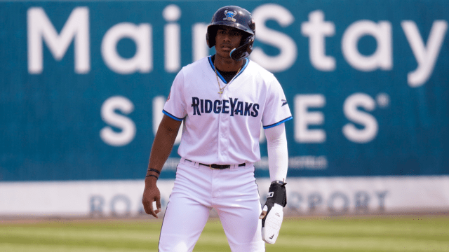Enddy Azocar stands on base during a minor league game