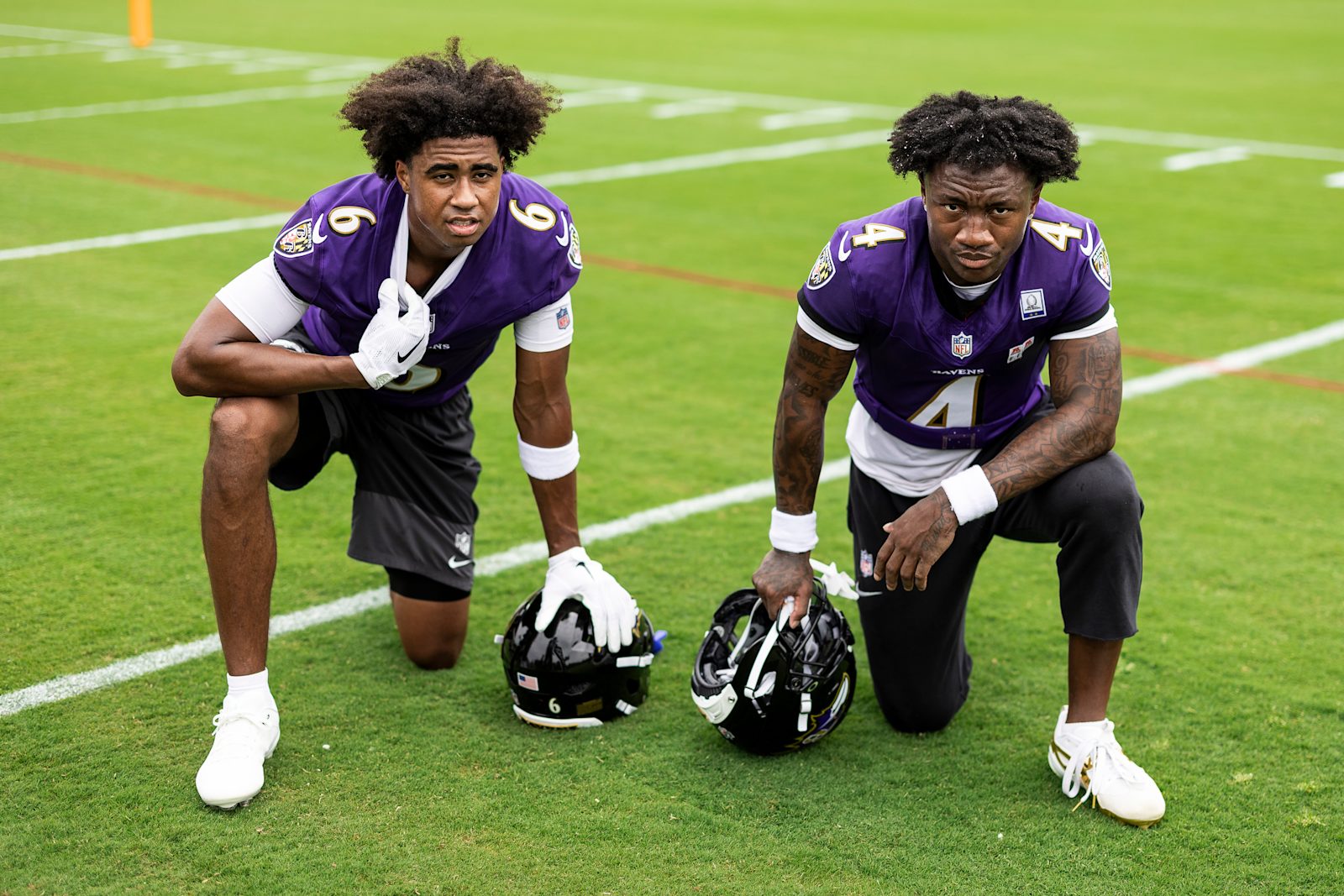 Ravens wide receivers Ja’Kobi Lane and Zay Flowers pose together on the practice field