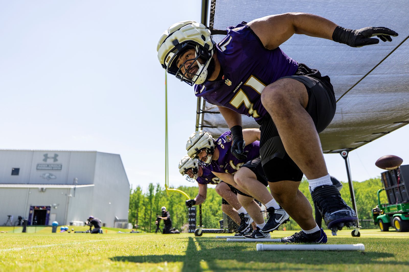 Ravens rookie guard Vega Ioane works through a drill during the 2026 offseason program