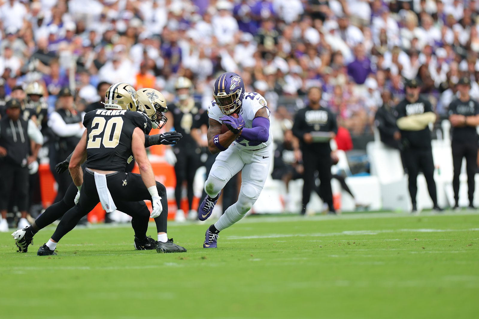 Derrick Henry cuts between Saints defenders during the Ravens’ Week 2 game at M&T Bank Stadium