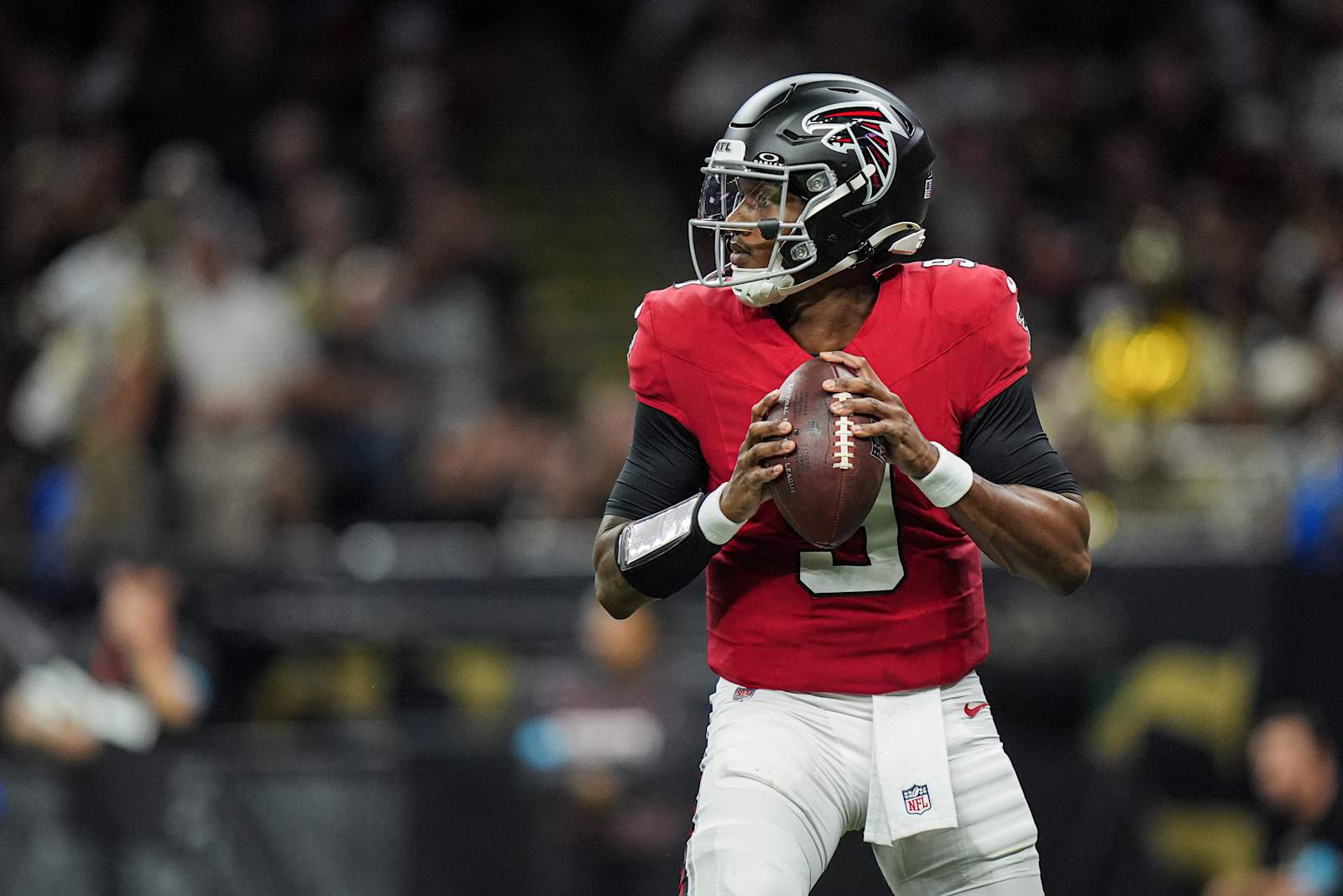 Michael Penix Jr. looks downfield to throw against New Orleans in Week 4