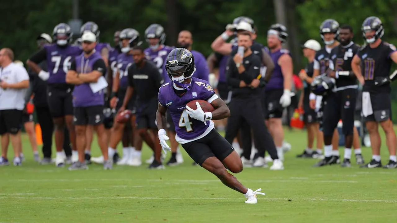 Zay Flowers runs a route during Ravens training camp