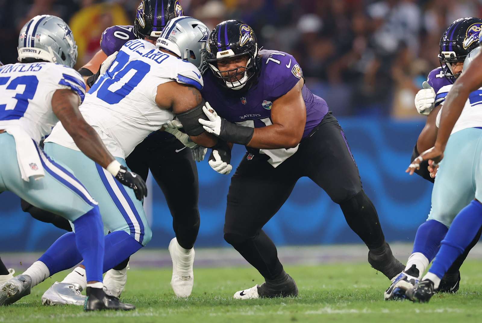 Vega Ioane blocks a Cowboys defender during the Ravens’ Week 3 win