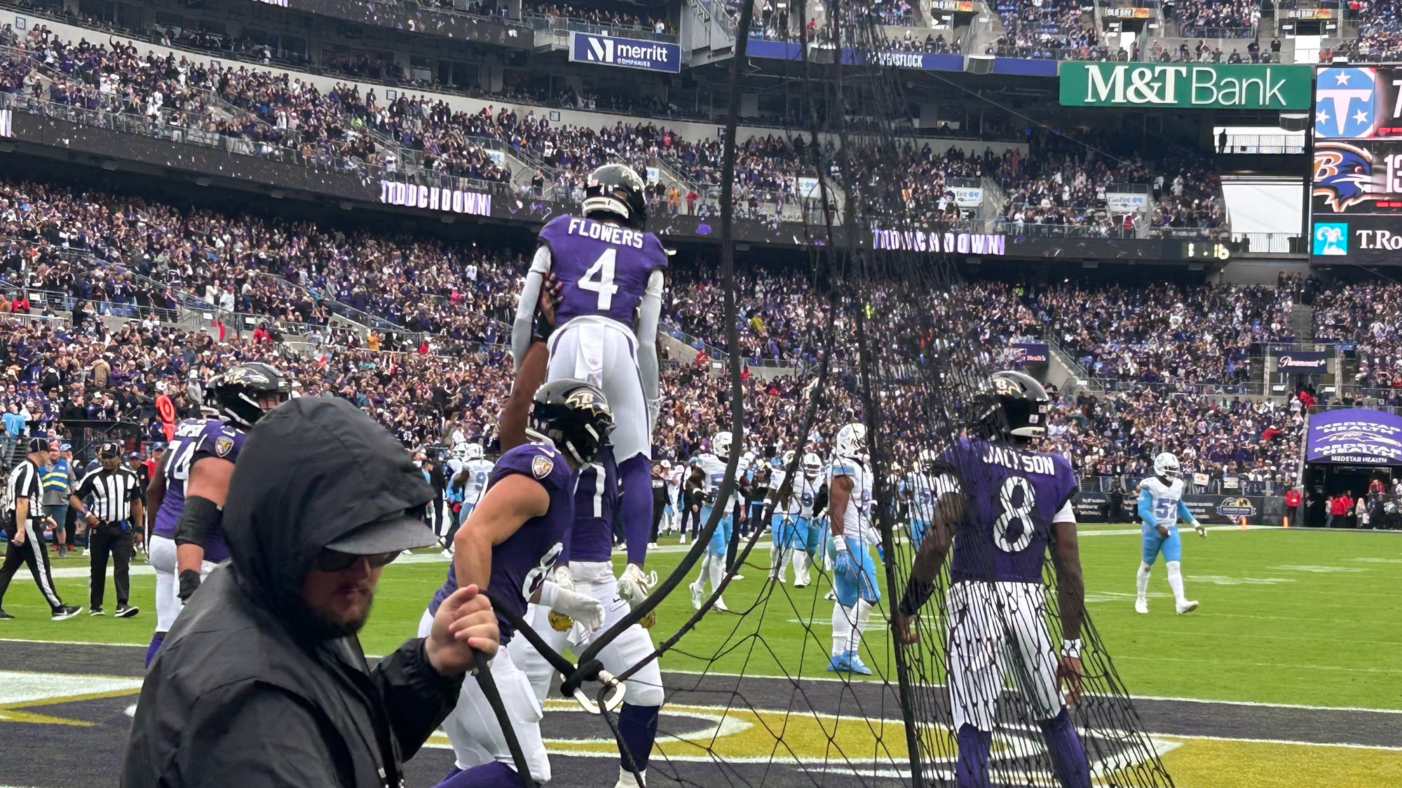 Zay Flowers is lifted by a teammate in the end zone after his Week 4 touchdown against the Titans