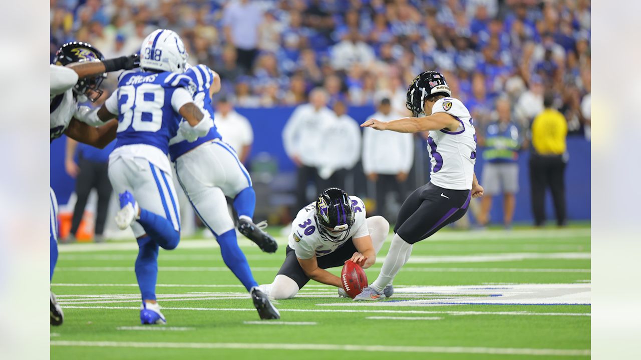 Tyler Loop kicks a field goal against the Indianapolis Colts