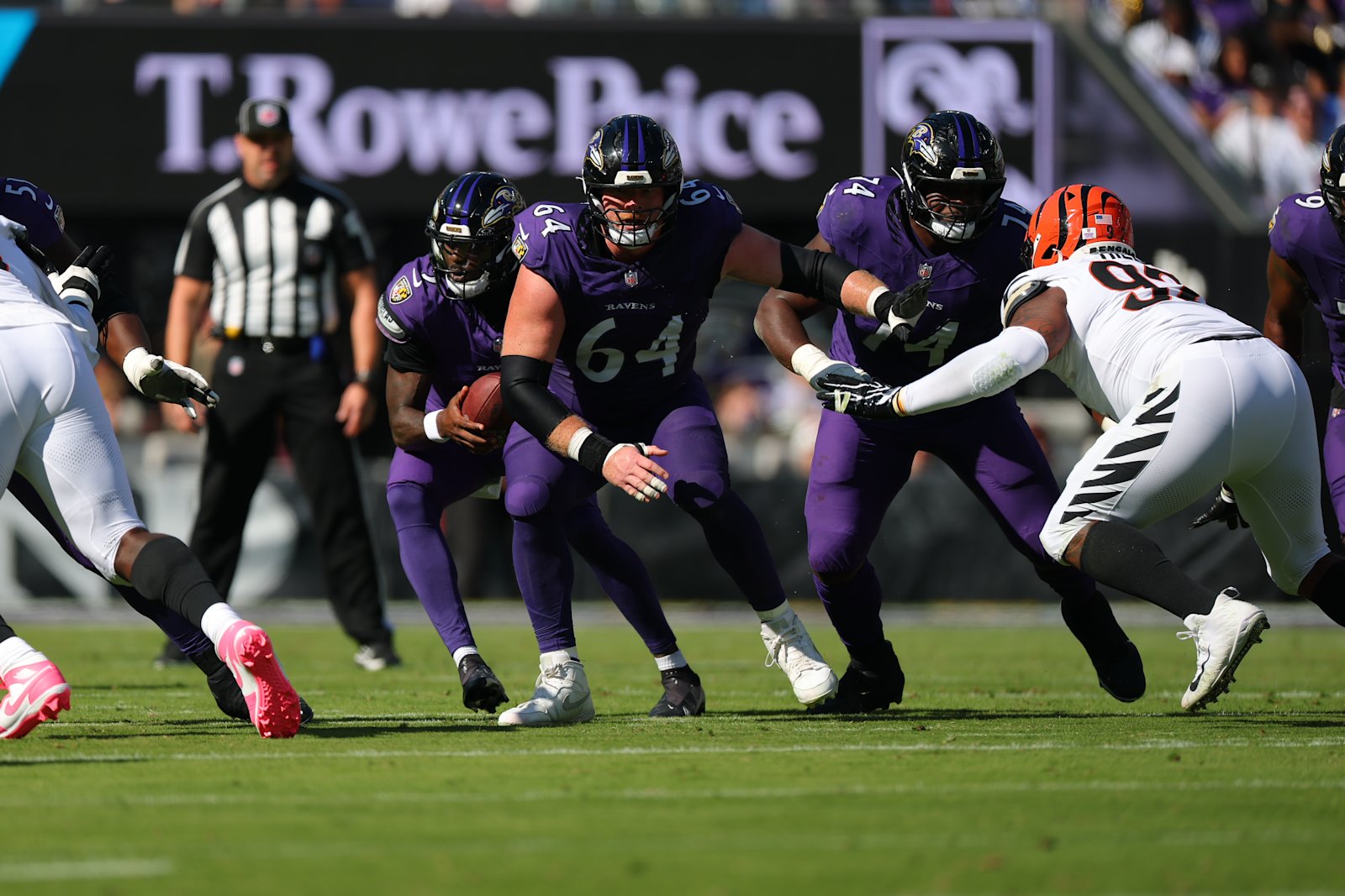 Cam Jurgens blocks in front of Tyler Huntley during his Ravens debut against Cincinnati