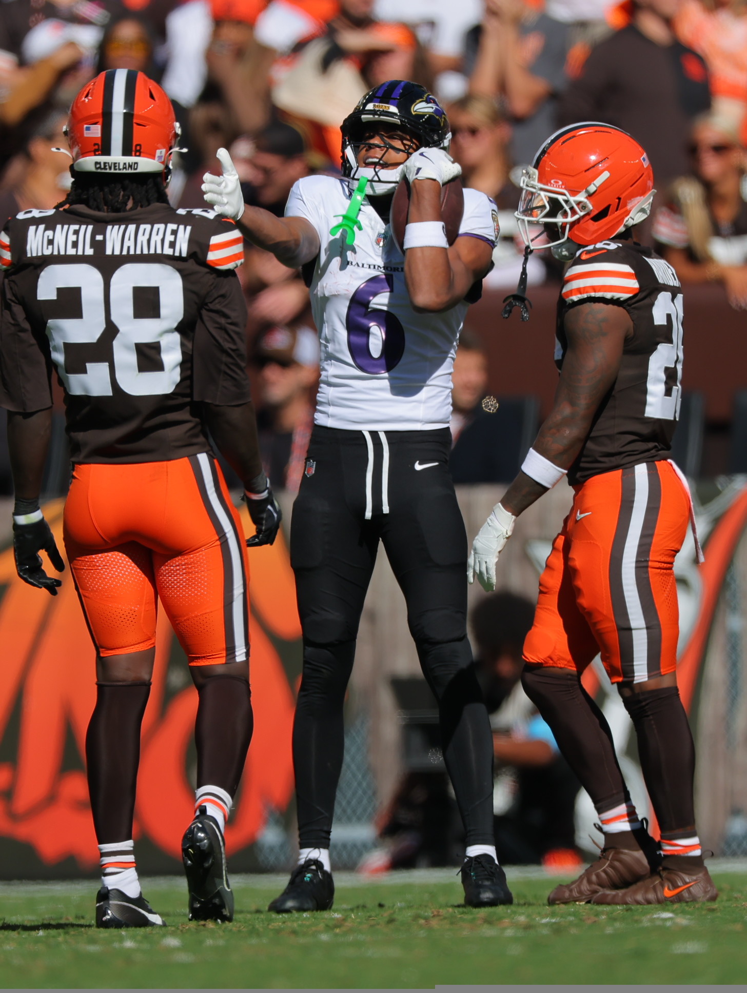 Ja’Kobi Lane catches a pass between Browns defenders in his return in Week 6