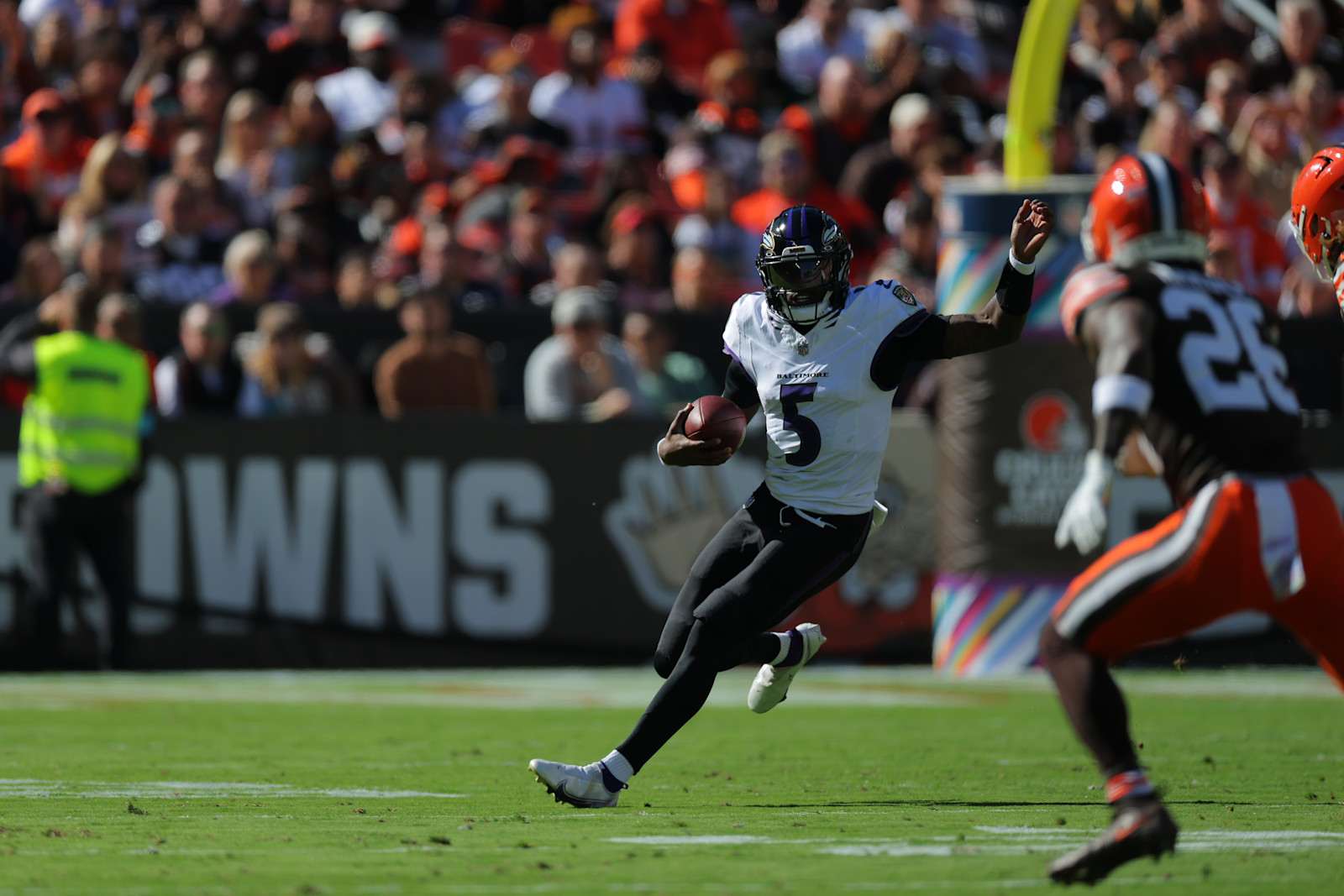 Tyler Huntley scrambles against Cleveland in Week 6