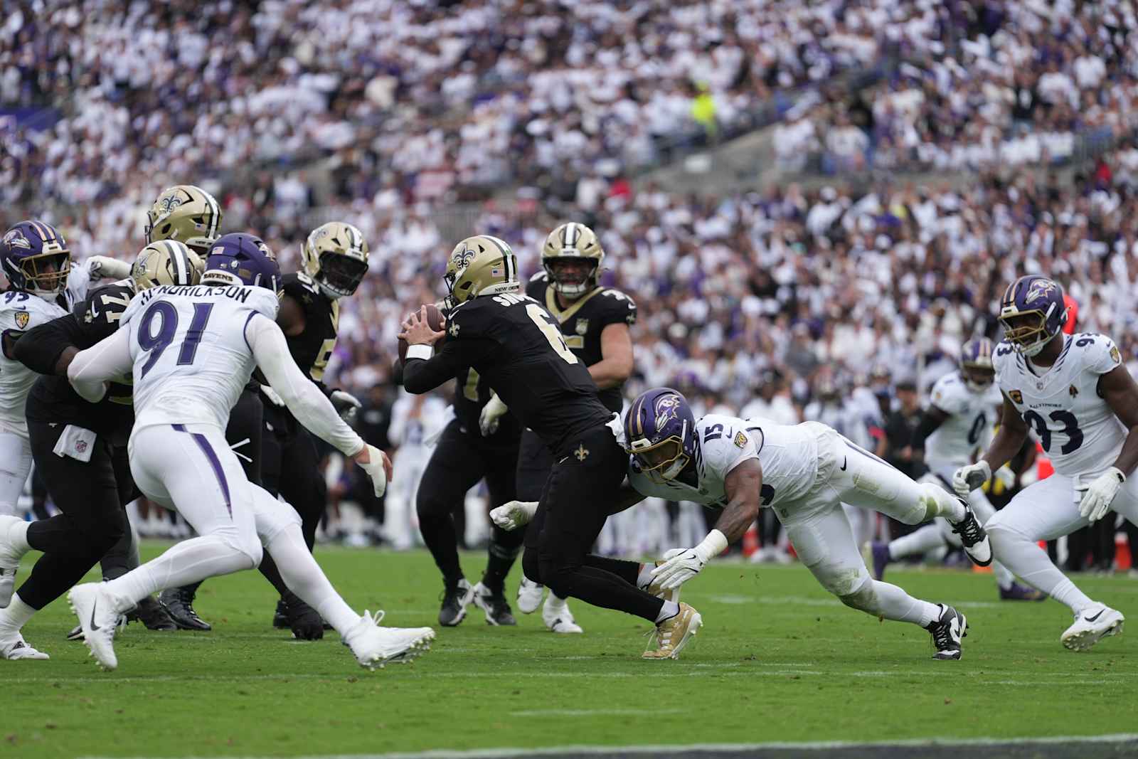 Trey Hendrickson and Mike Green pressure Saints quarterback Tyler Shough during Week 2