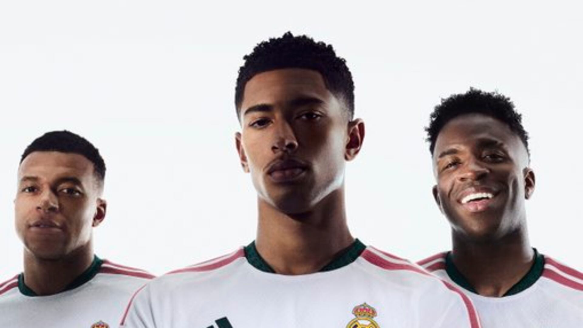 Kylian Mbappé, Jude Bellingham and Vinícius Júnior pose in Real Madrid's 2026-27 home shirt