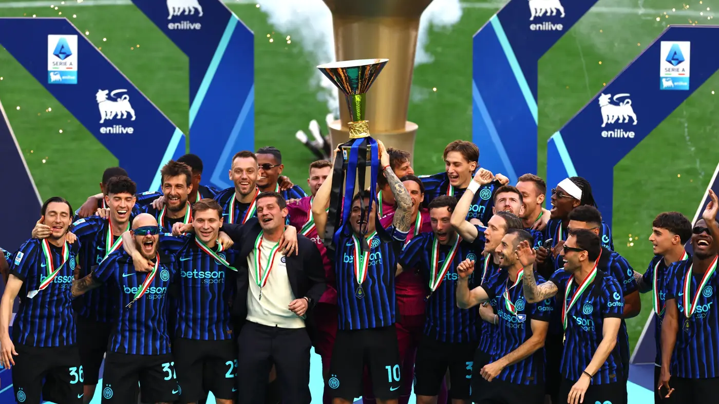 Inter players lift the Serie A trophy after winning the 2025-26 championship