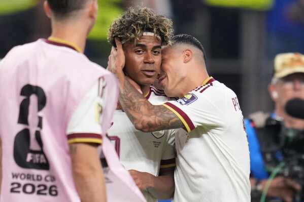 Lamine Yamal and Pedro Porro celebrate Spain reaching the World Cup final