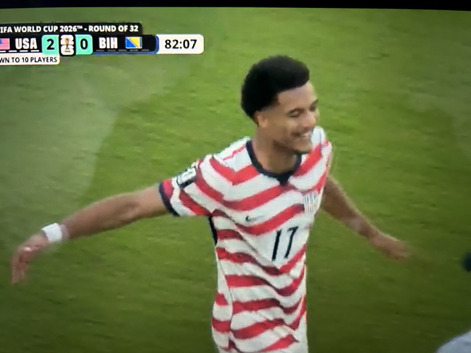 Malik Tillman celebrates after scoring a free kick to make it 2-0 over Bosnia
