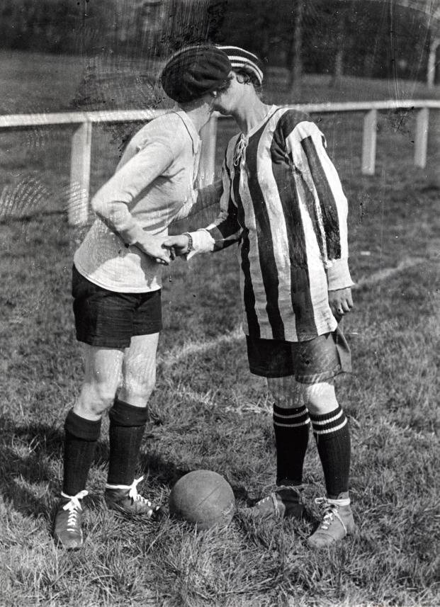 The captains of England's Dick, Kerr Ladies and France greet before a 1920 international