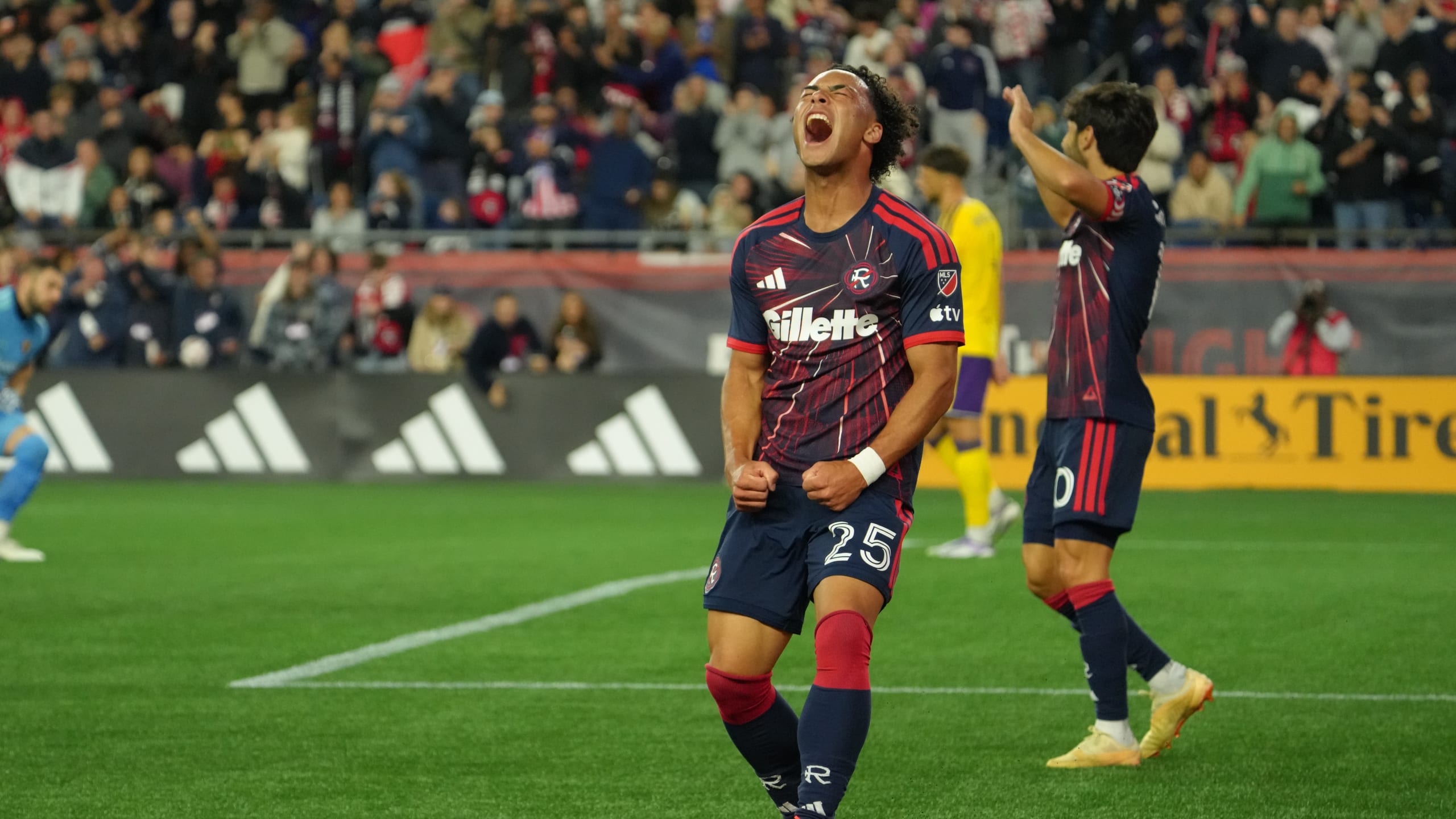 Peyton Miller celebrates for New England against Orlando City