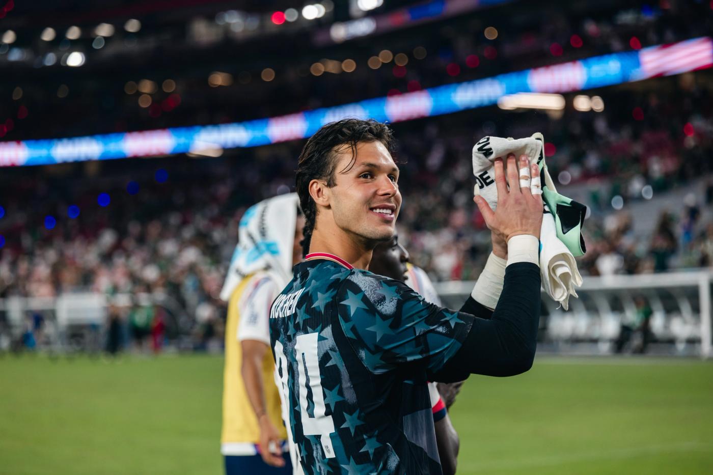 Diego Kochen applauds after the win over Mexico