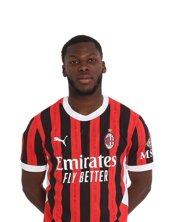 Yunus Musah in AC Milan's red and black shirt